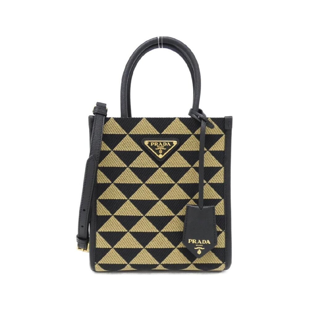Prada Symbole Tote Bag beige black embroidered geometric triangle black leather